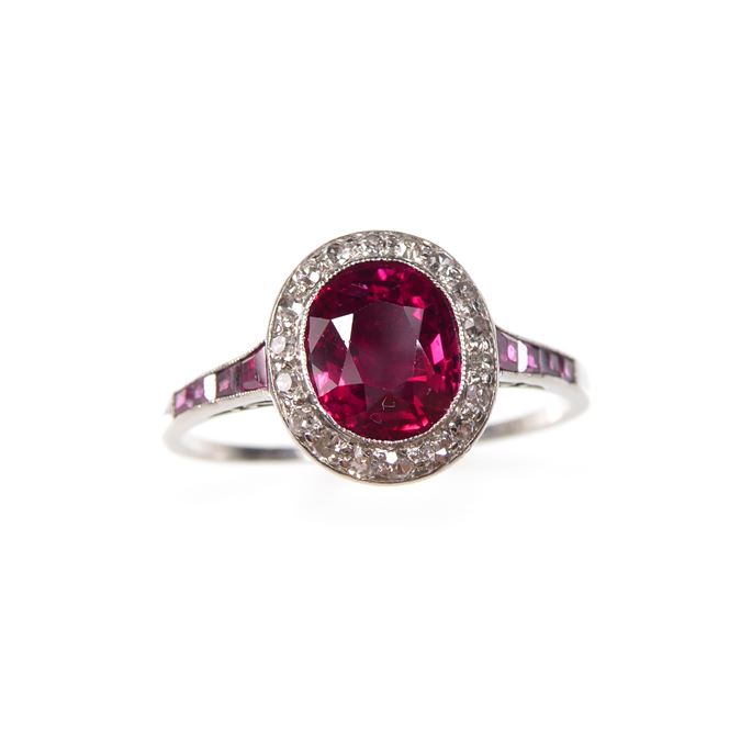 Ruby and diamond cluster ring with a central oval cut Burma ruby | MasterArt